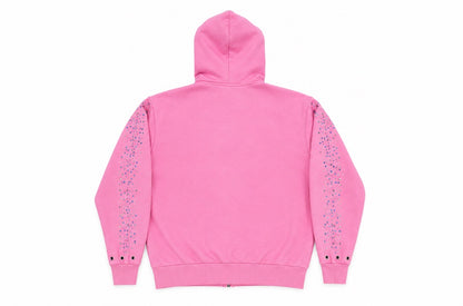 A pink zip-up hoodie shown from the back, featuring decorative vertical lines of blue and purple rhinestones running down both sleeves.